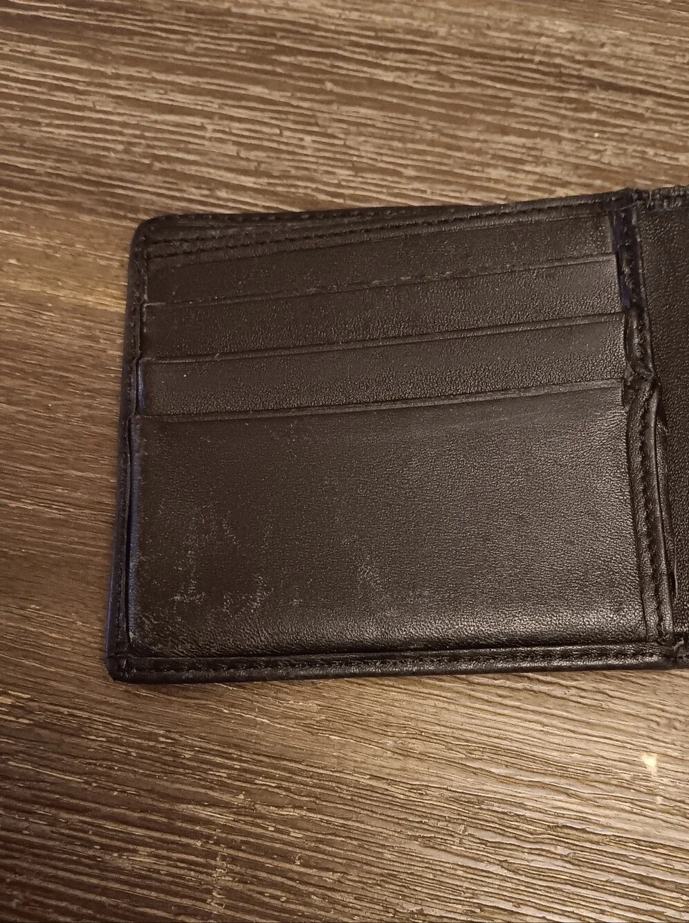 Gucci Black Leather Bifold Wallet with Silver GG Accent